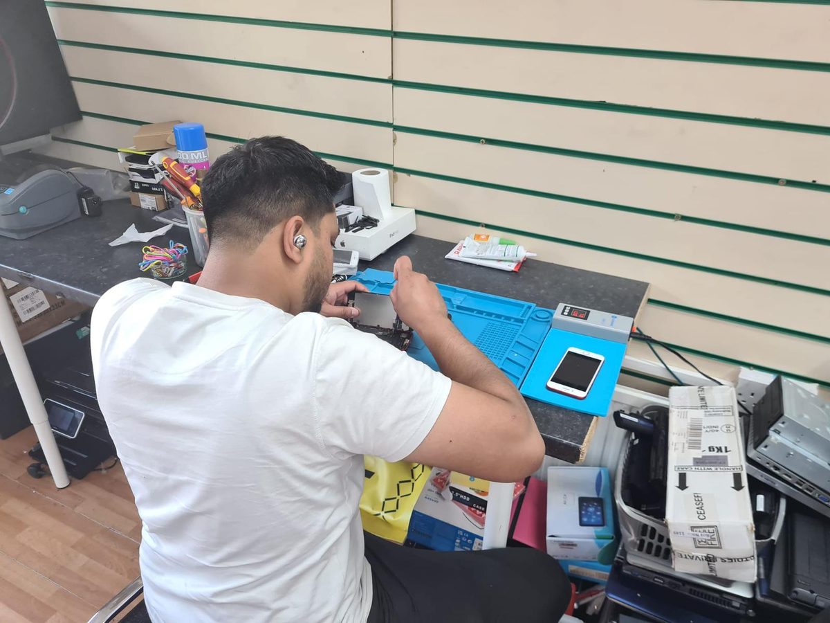 Stacks of electronic waste waiting to be refurbished and given a second life